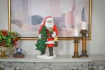 Santa Holding Christmas Tree Figurine