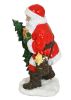Santa Holding Christmas Tree Figurine